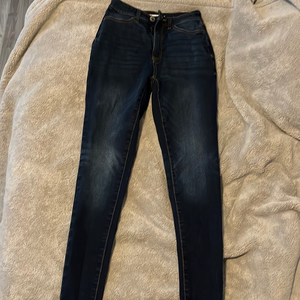 Dark blue denim jeans.